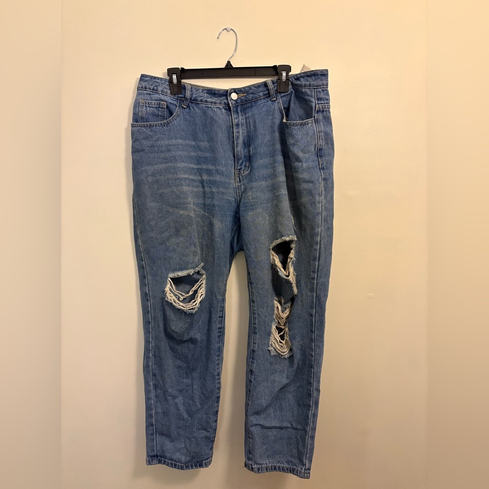 Curvy light wash ripped jeans